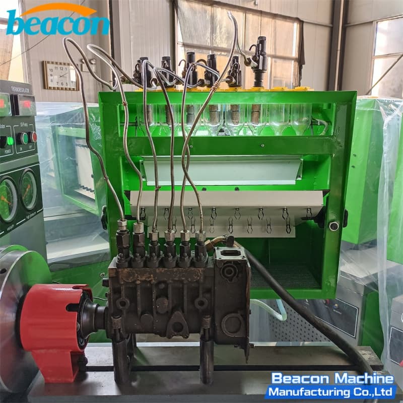 Close up of fuel injection pump tester measuring glass graduates