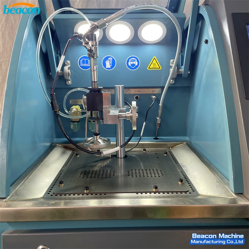 Internal testing chamber detail with high-pressure rail and injector mounting fixture.