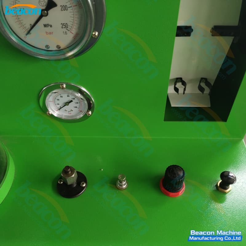 Close-up of the digital control interface and hydraulic pressure regulation knobs Close-up of the digital control interface and hydraulic pressure regulation knobs