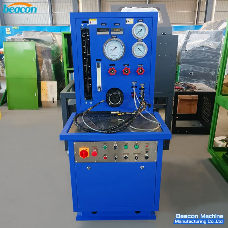 Perspective view of the green PT212 Cummins PT fuel pump test stand in the manufacturing workshop. Perspective view of the green PT212 Cummins PT fuel pump test stand in the manufacturing workshop.