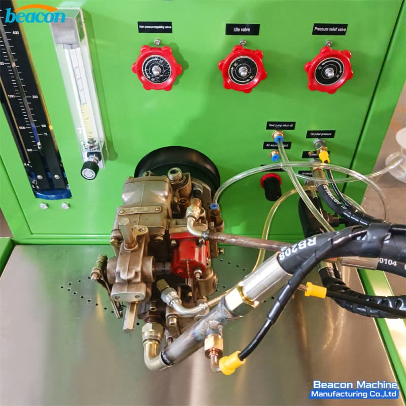 Top-down view of the test bench working table showing fuel line connections, dual flowmeters, and red control valves. Top-down view of the test bench working table showing fuel line connections, dual flowmeters, and red control valves.